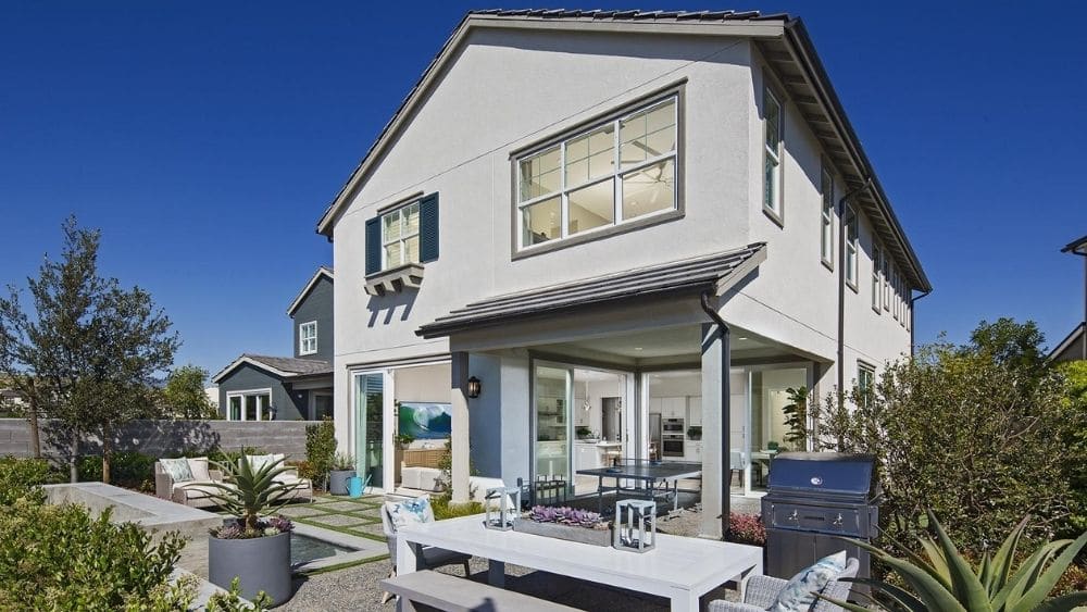 The backyard of a Spanish-style home.