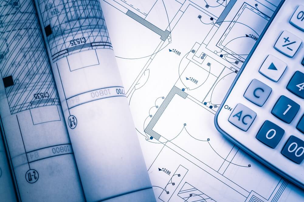 Calculator on top of architectural blueprints