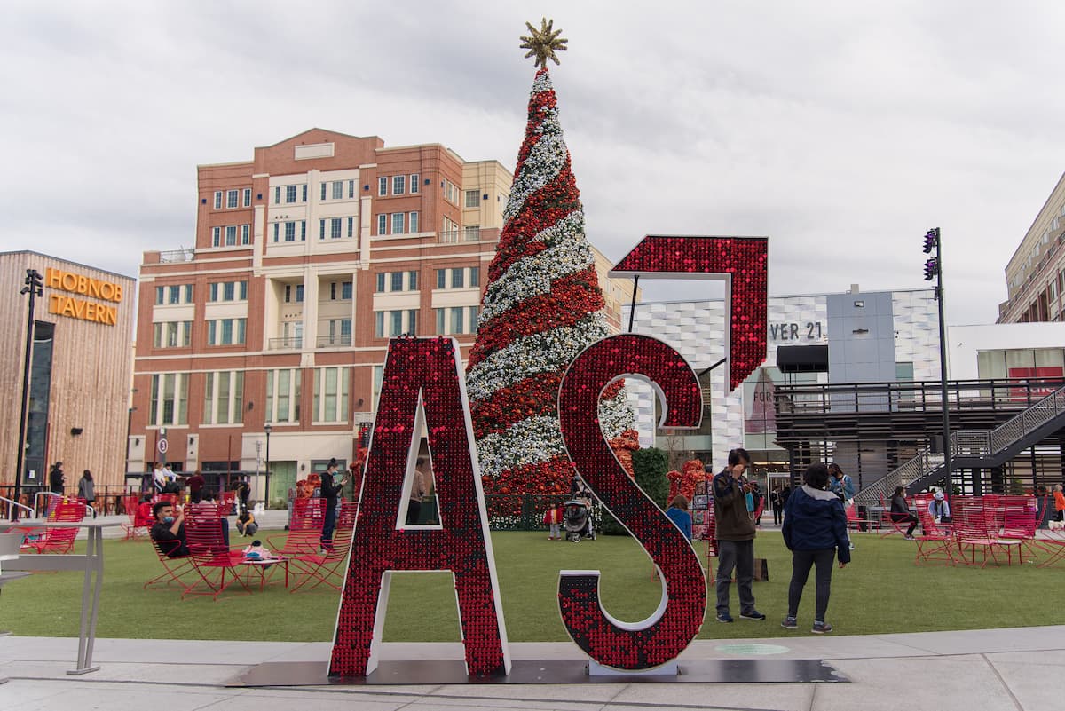 Atlantic Station area decorated for the holidays with red and white tree