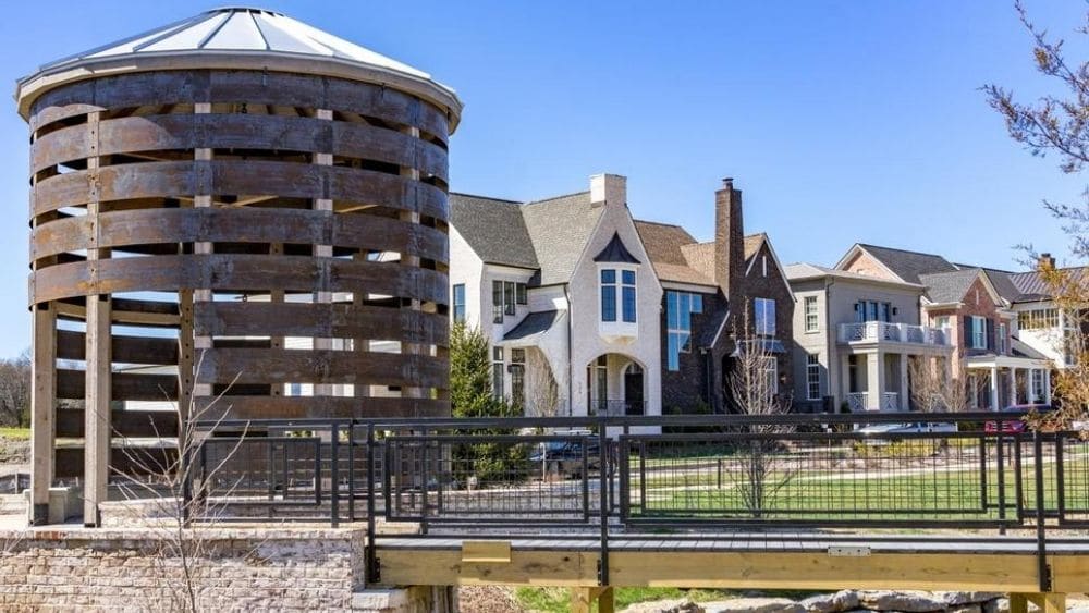 Row of homes with well-maintained lawns.
