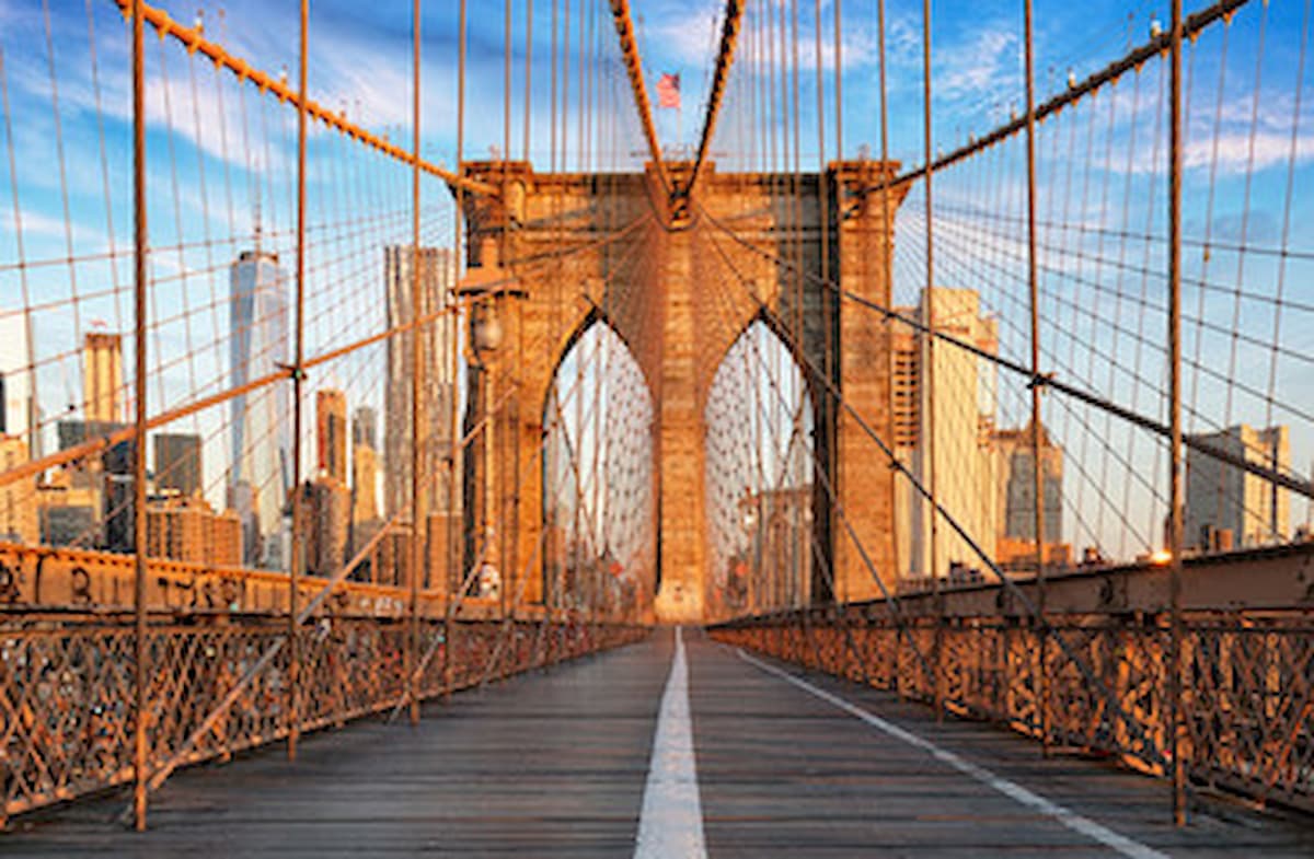 View of structure and span on the Brooklyn Bridge on a sunny day