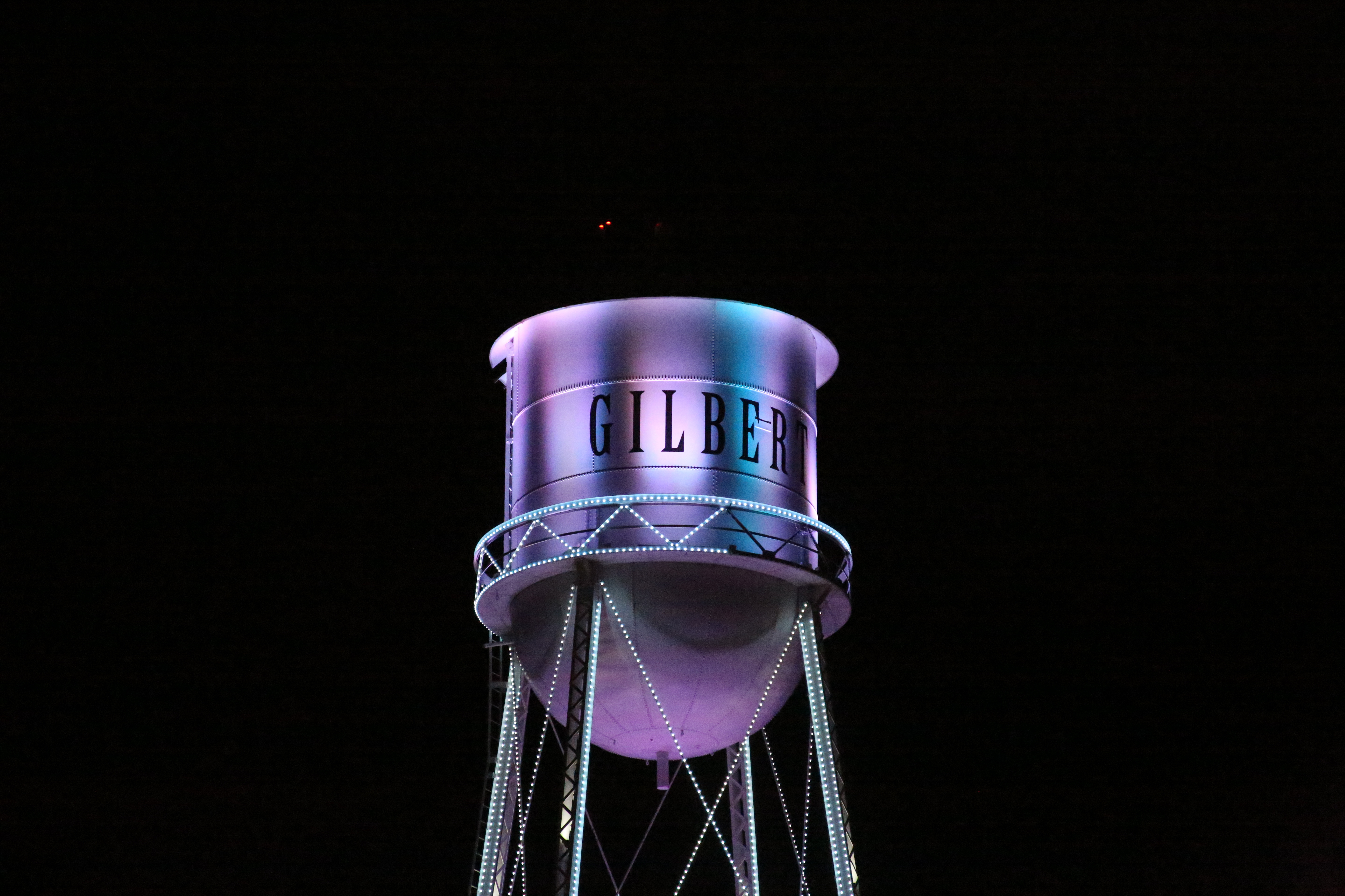 Gilbert water tower illuminated at night