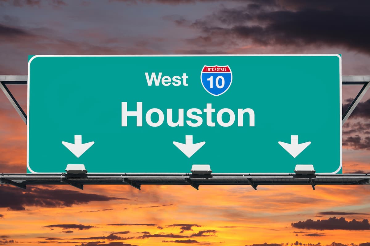 Houston I-10 sign at sunrise