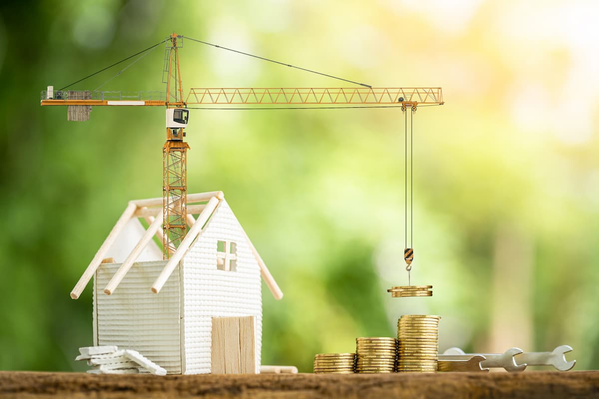 model-home-crane-stacked-coins