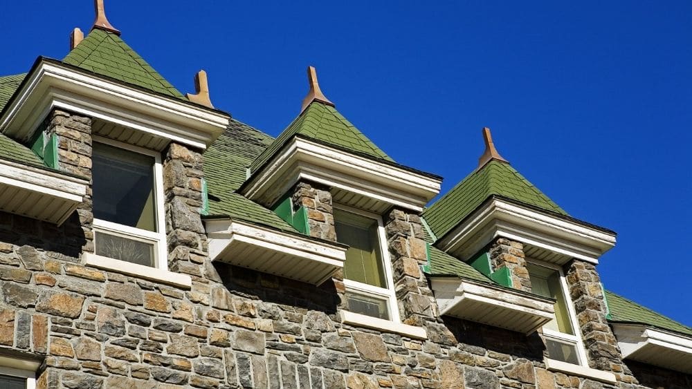 Stone turrets with green roofs.