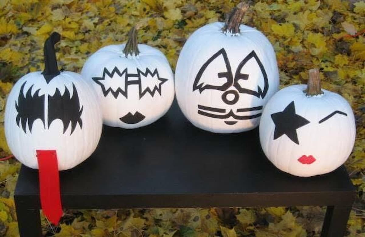 Four Halloween pumpkins painted to resemble the members of KISS