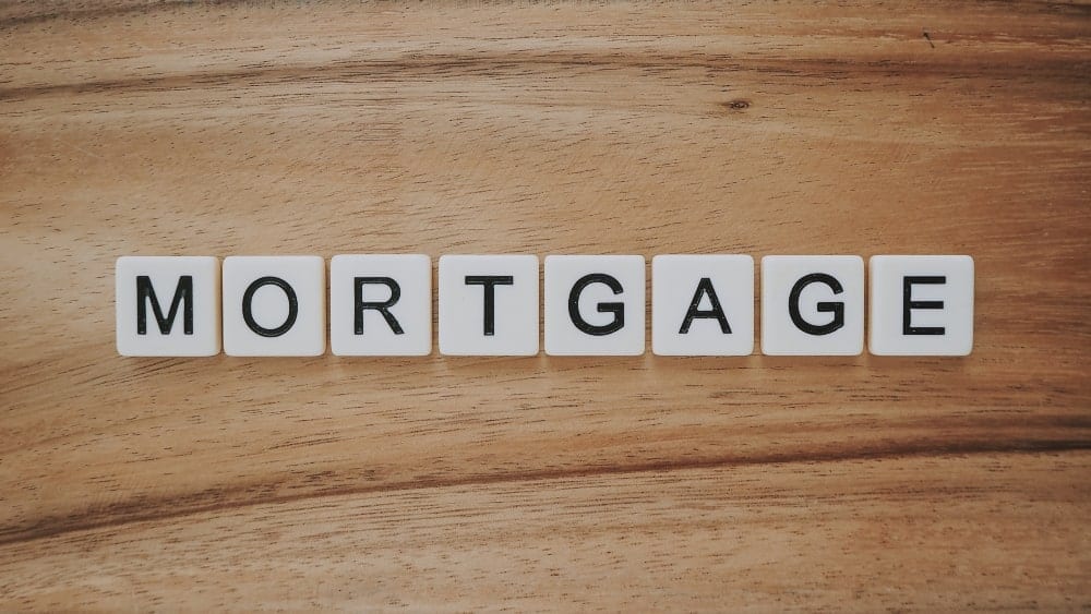 Scrabble tiles arranged to spell “mortgage”