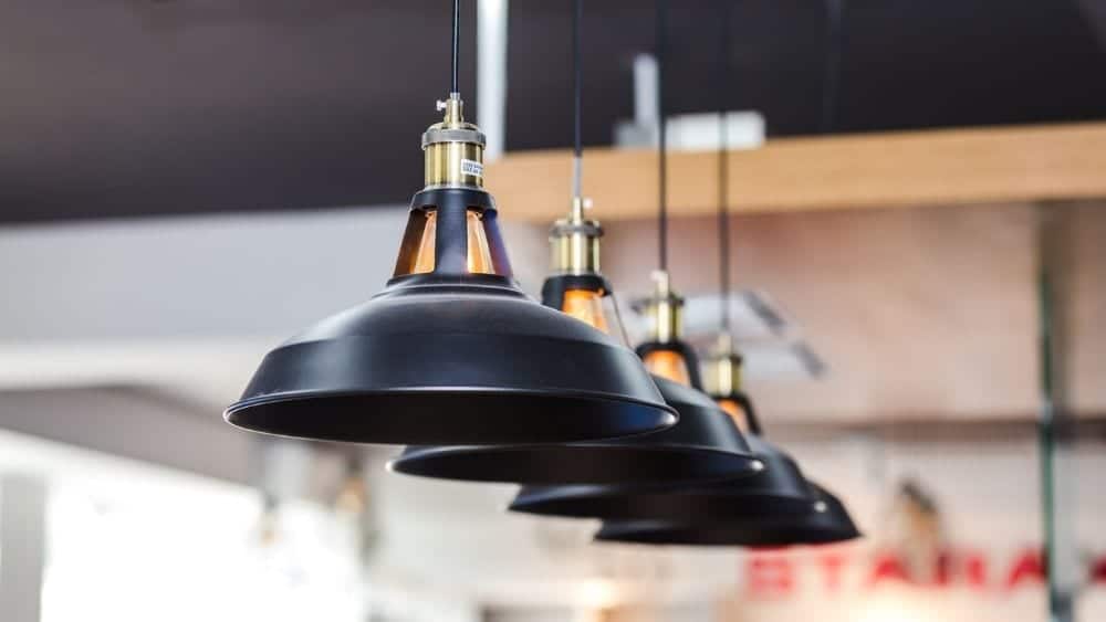 Black pendant lighting for a kitchen.