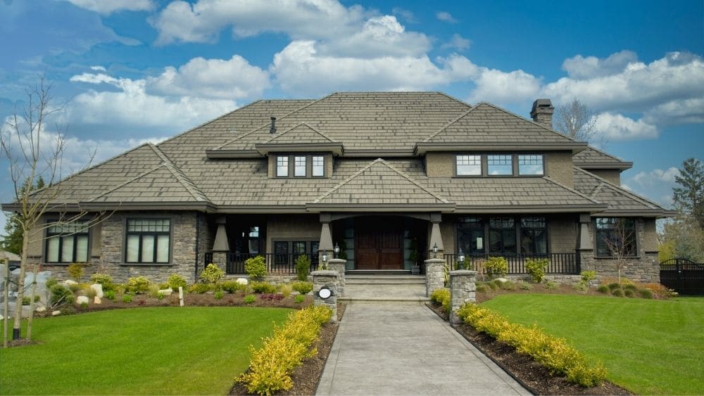 Custom home with stone siding.