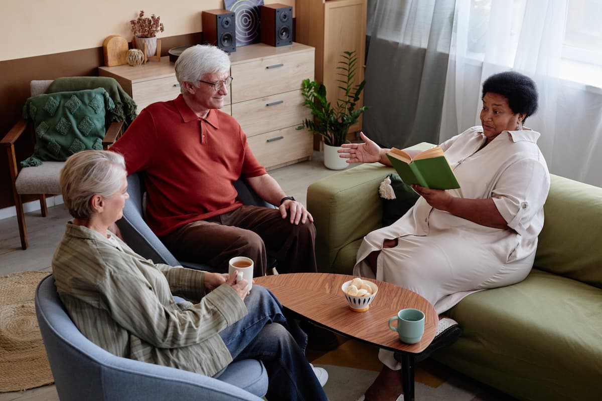 seniors having coffee and cookies at book club