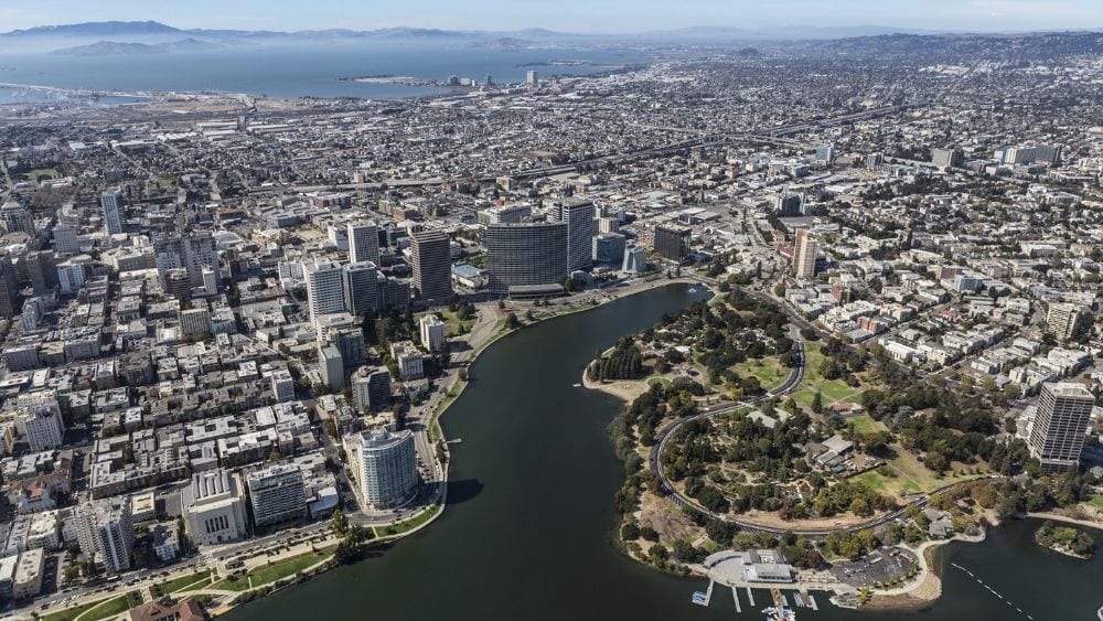 Aerial view of a city in a mountain valley.