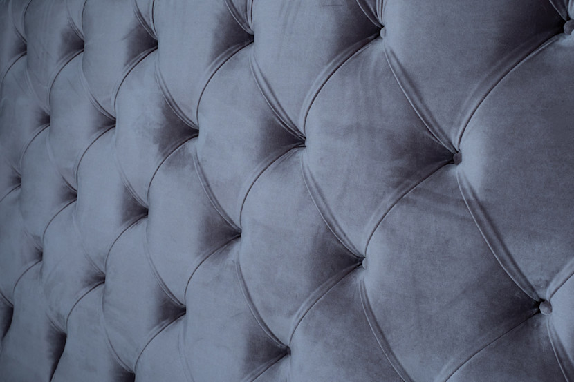 Blue tufted headboard