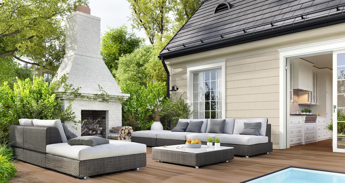 Backyard deck and home exterior stained in Taupe by Behr