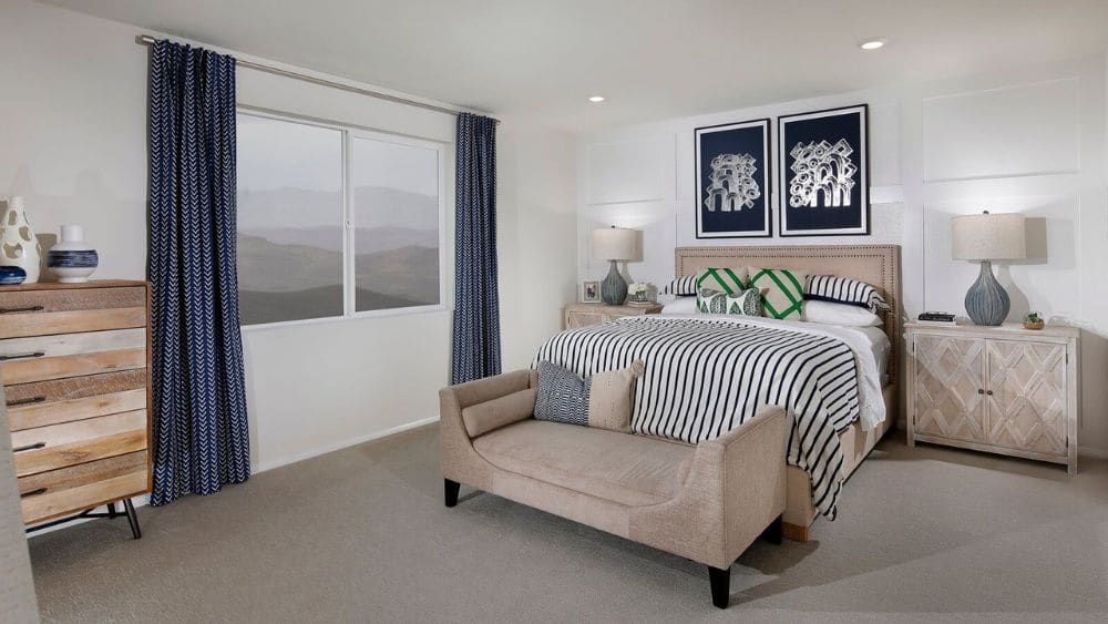 A bedroom decorated with blues and browns.