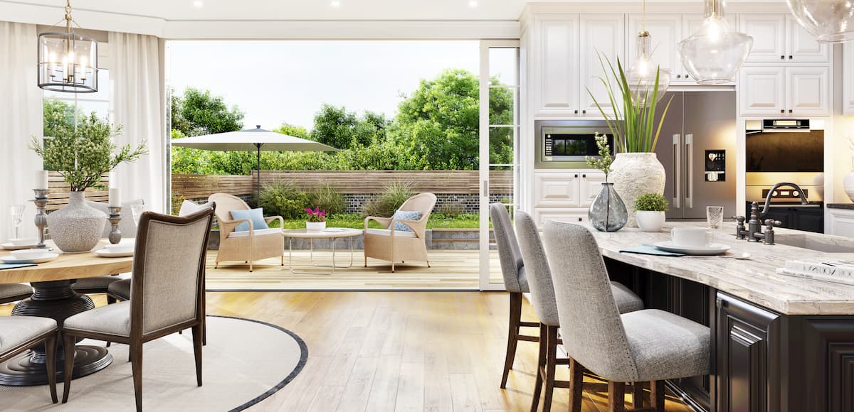 open main floor living leading to outside patio area with seating