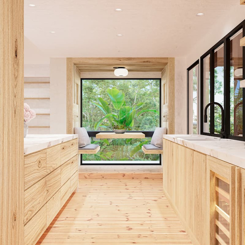 Japandi style dining nook with light wood floors, stone counters and view of greenery outside