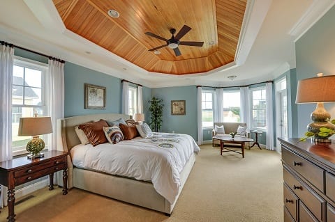 beachy chic style in the Herring Point Plan by Schell Brothers in Lewes, Del., with wood ceiling and blue nautical colors