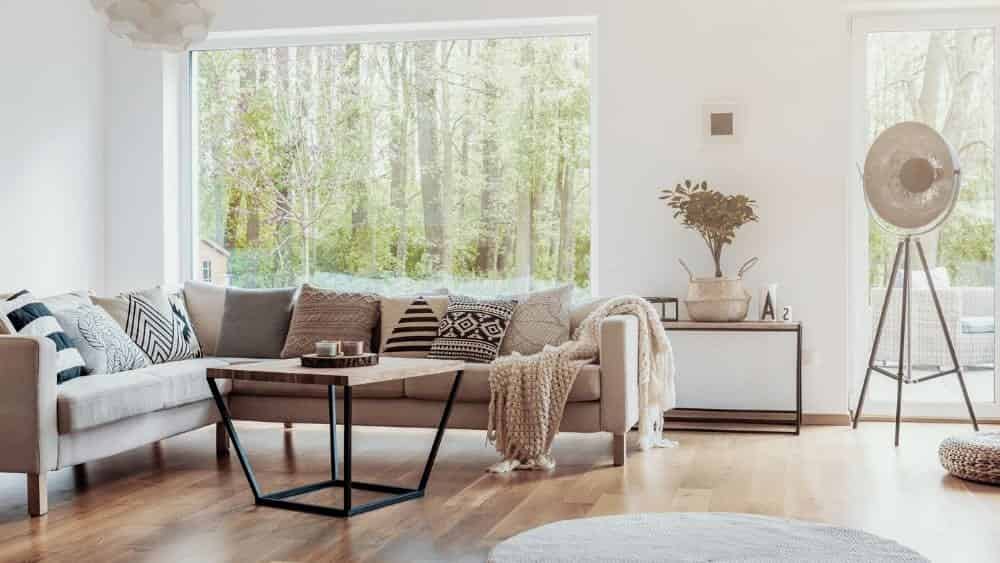 white living room with big glass windows