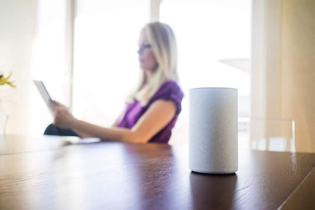 woman-using-smart-home-hub-1024x683