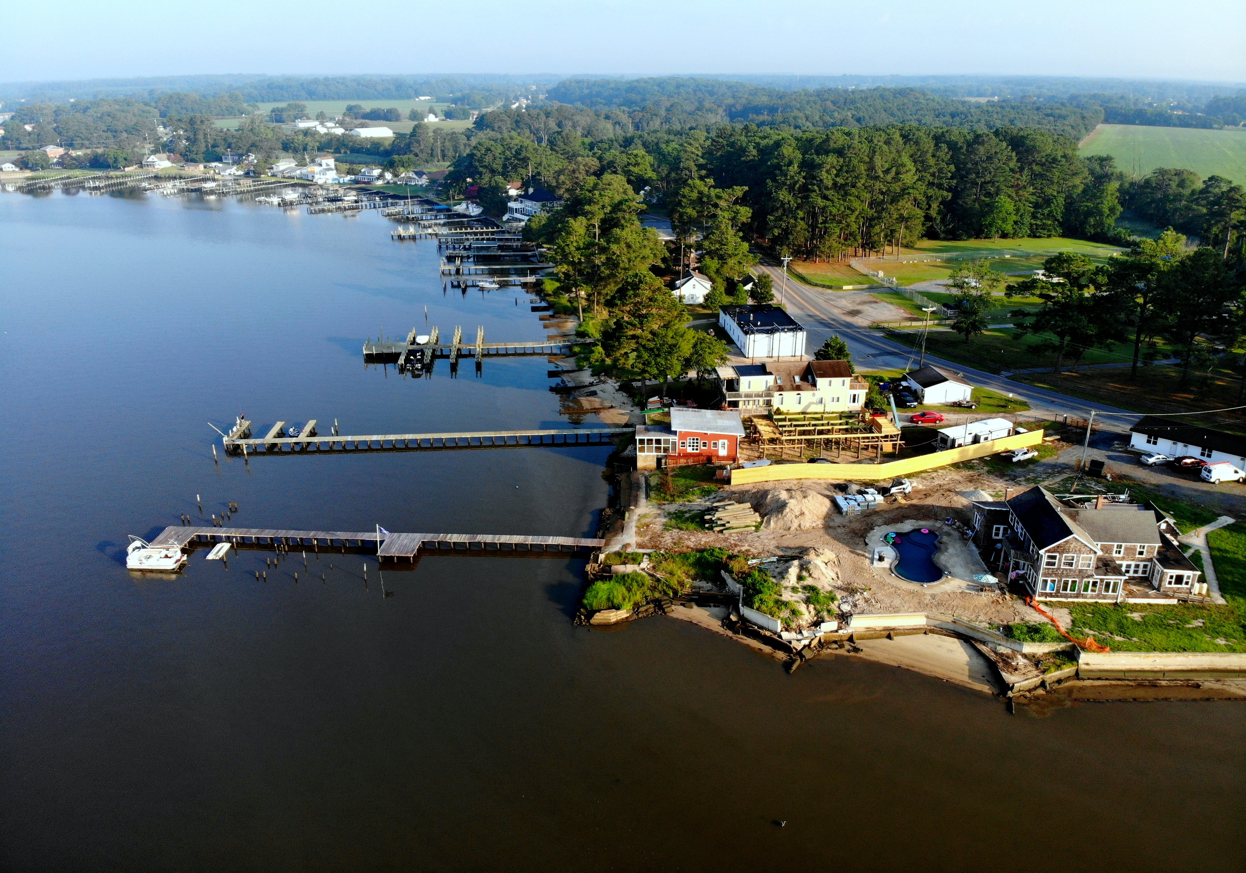 aerial view of waterfront homes with private docks