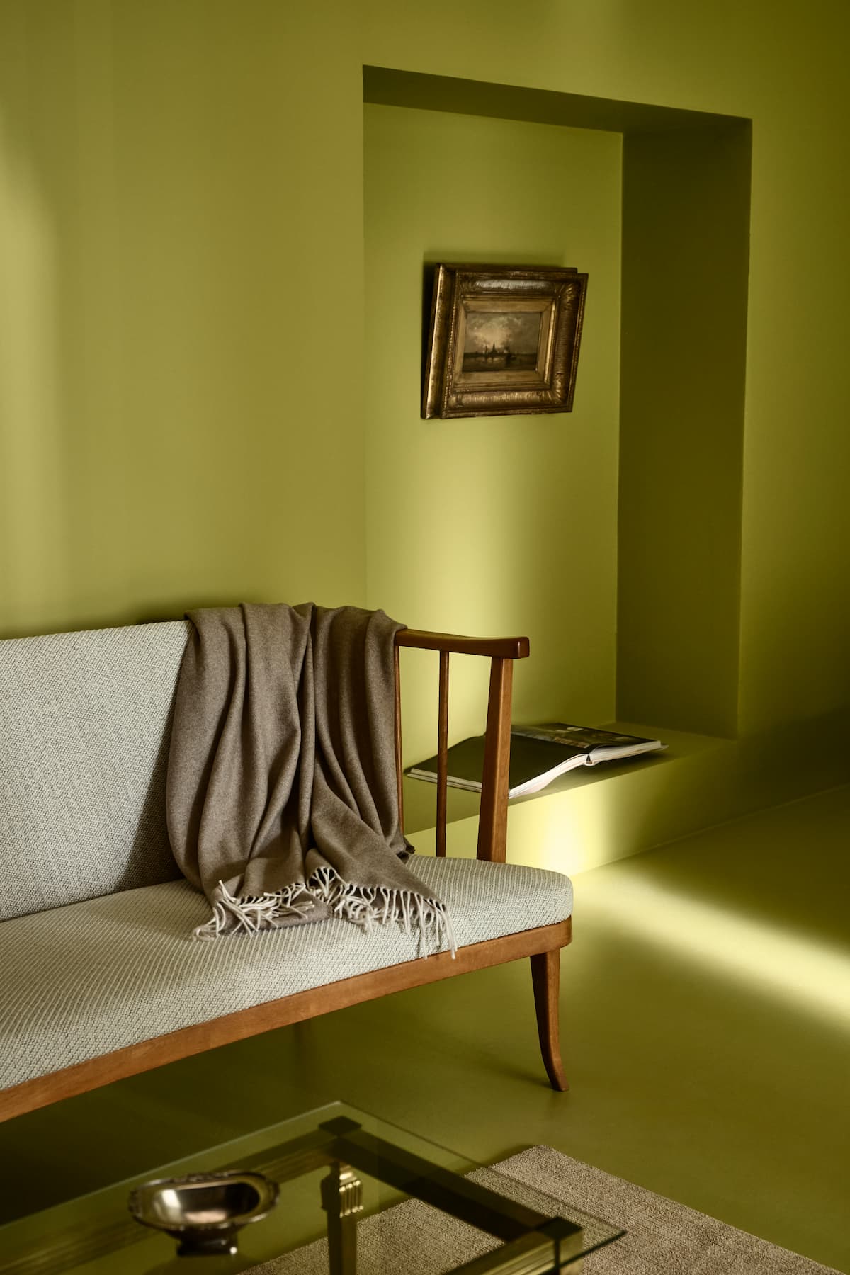 Paint Color of the Yea6 for PPG, Secret Safari, which is a lime green, shown here in a foyer.