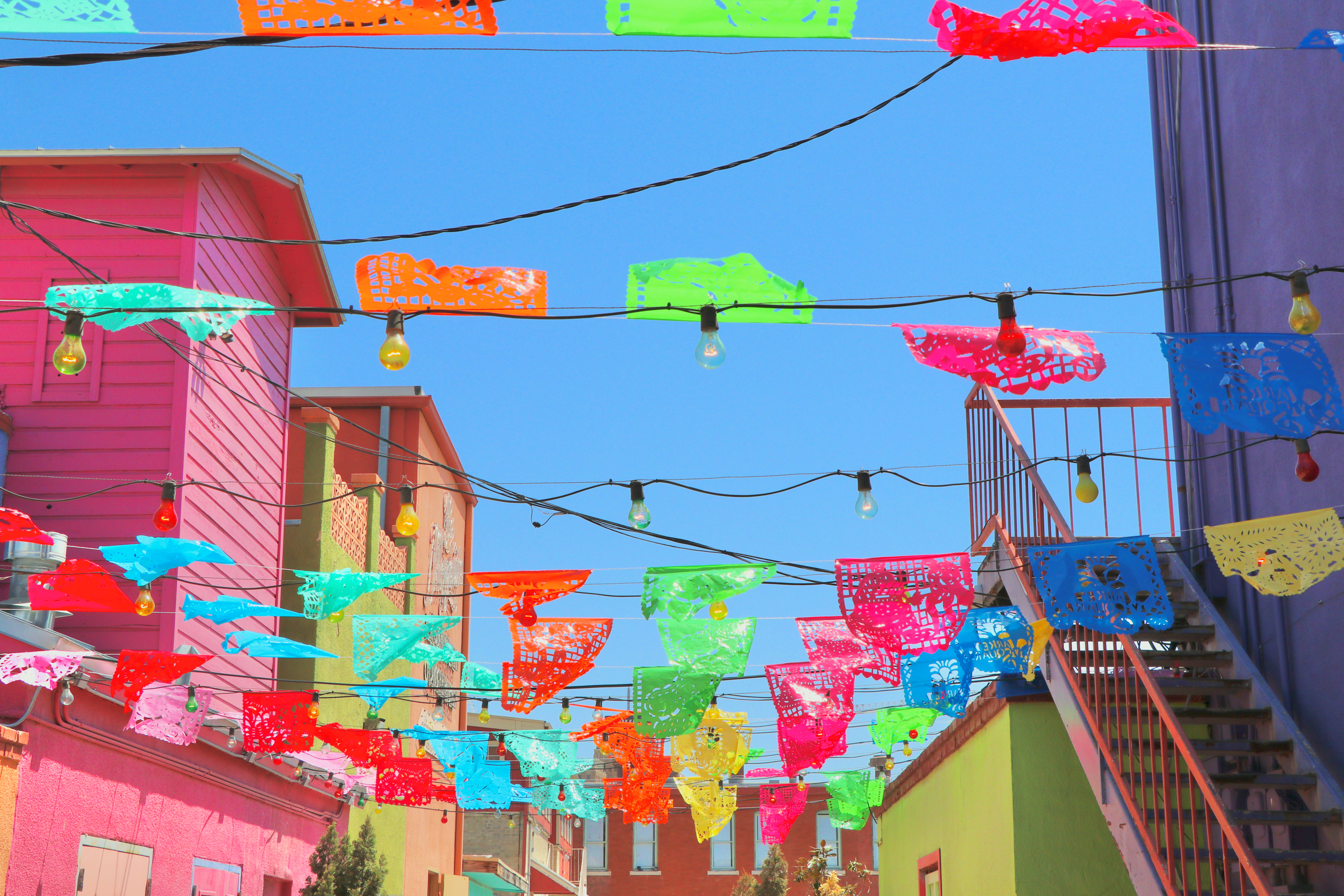 festive colorful flags flying over the market