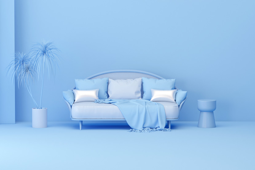 Blue-violet living room in monochromatic color, with sofa, throw pillows, walls and plants