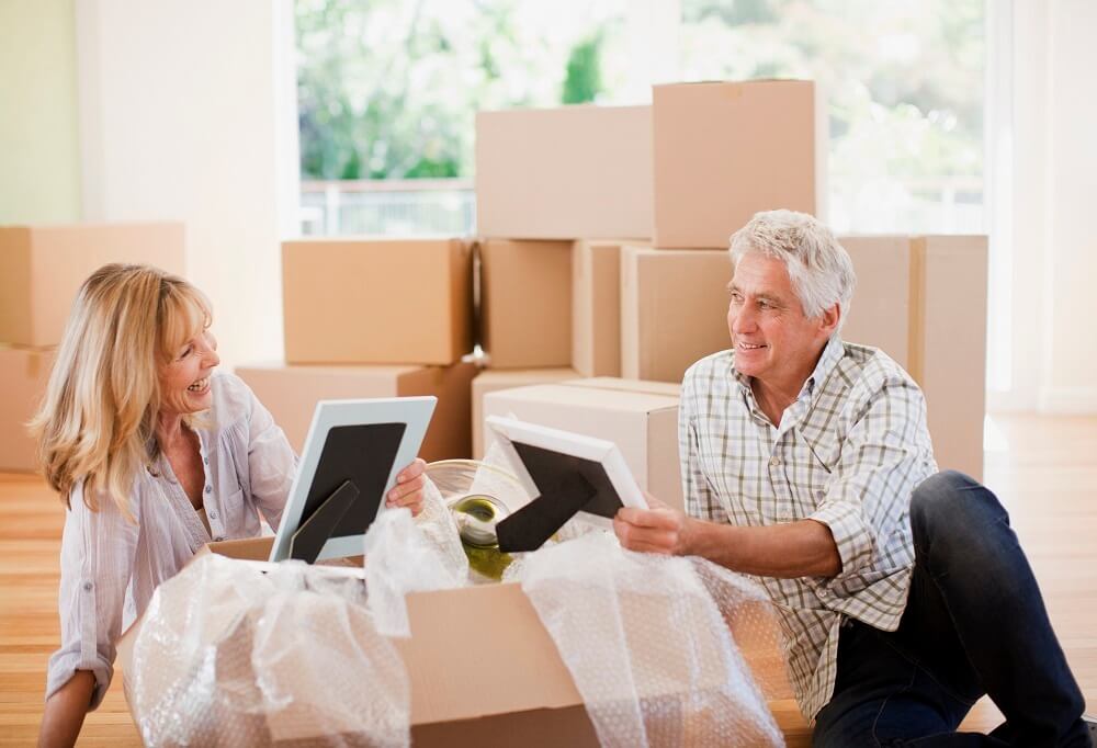 active-adult-couple-unpacking