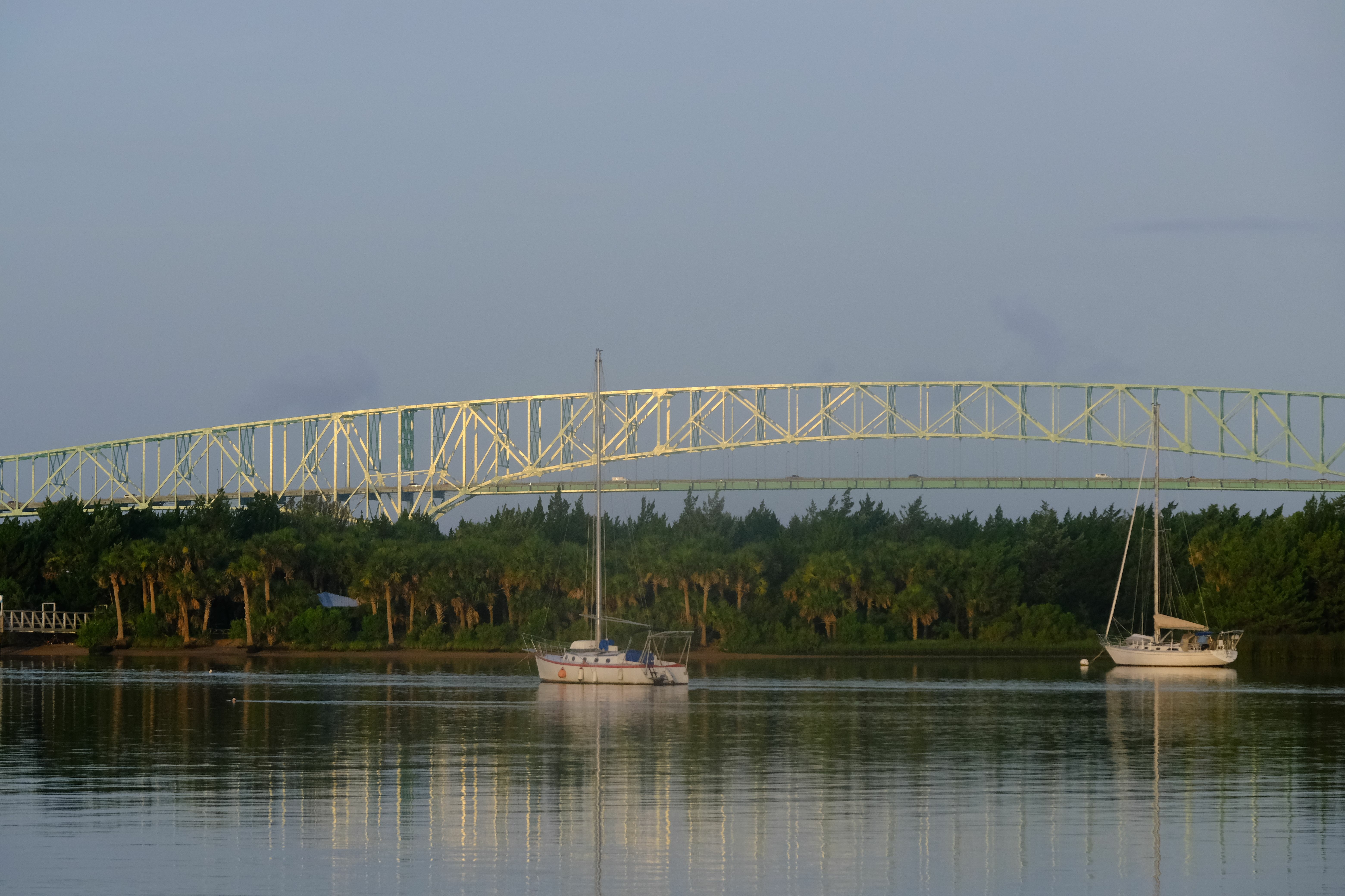 Sailboats under a bridge on St. John's River