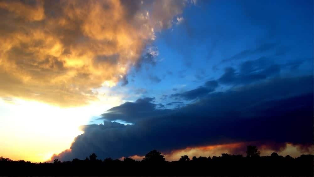 Bright yellow and blue sky above Alamos County.