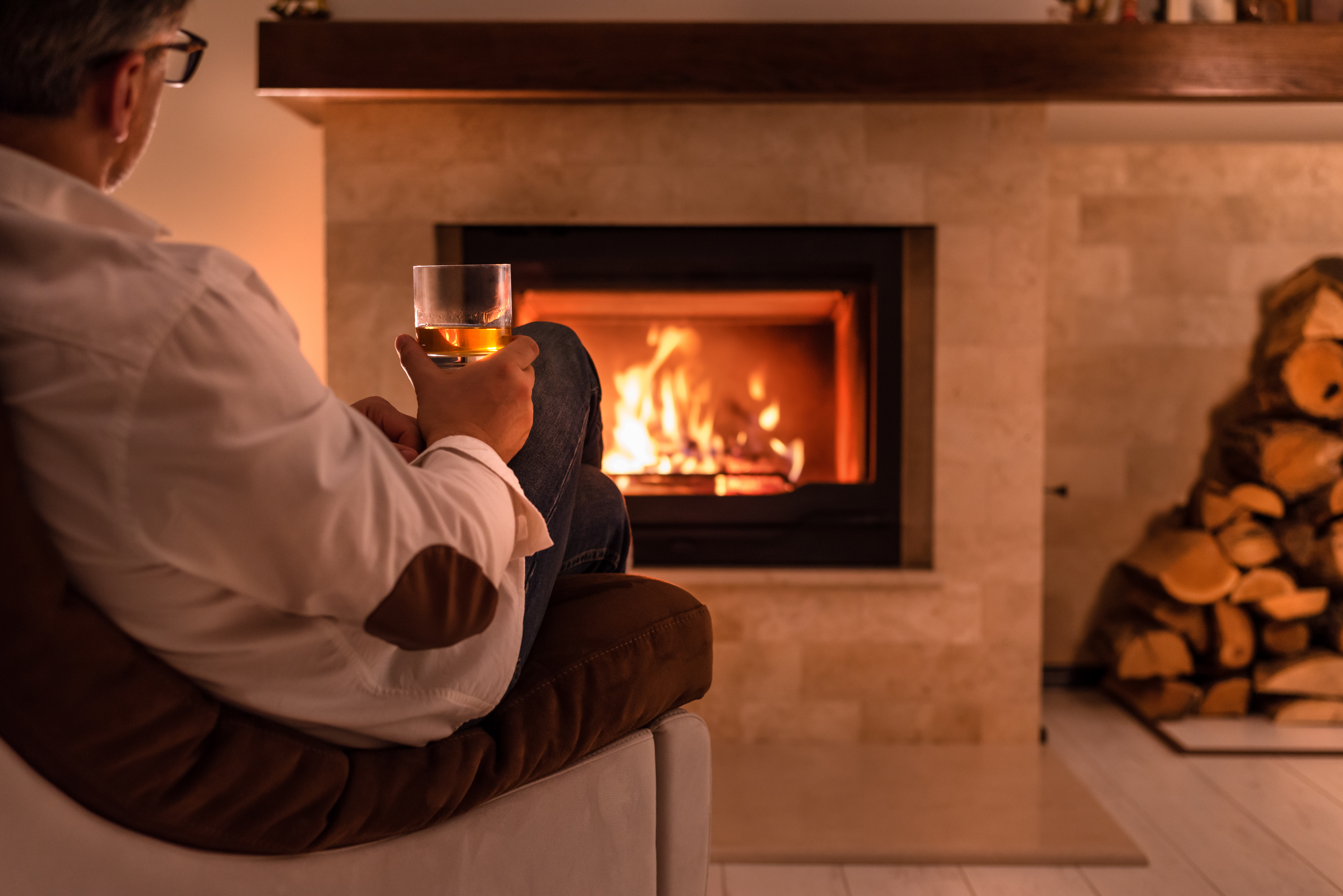 man-in-front-fireplace