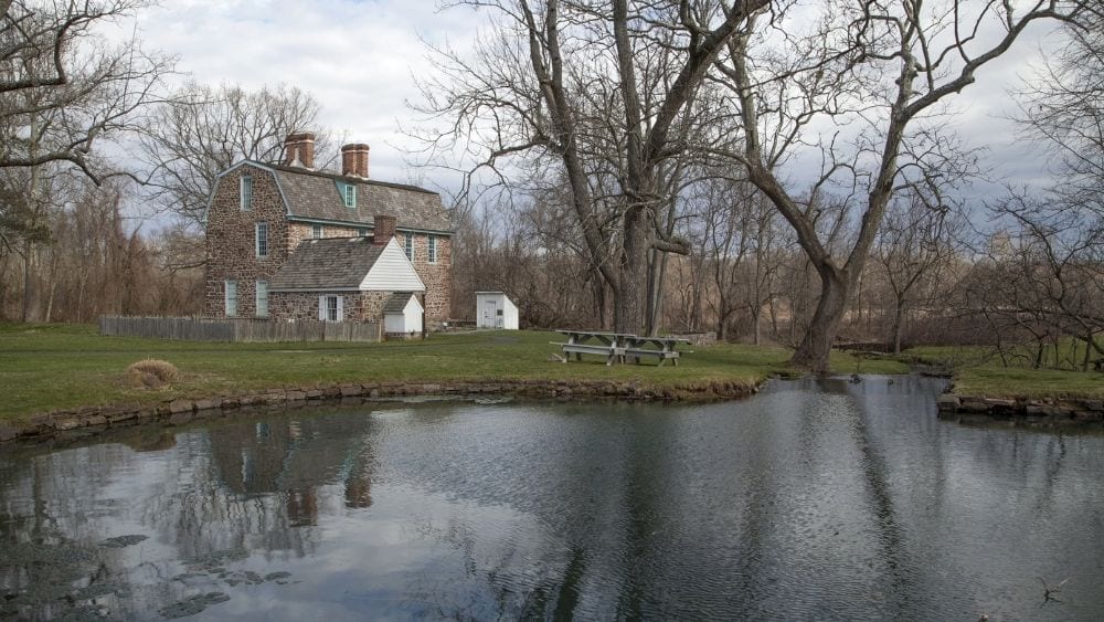 A large home next to a pond in Montgomery County, Pennsylvania.