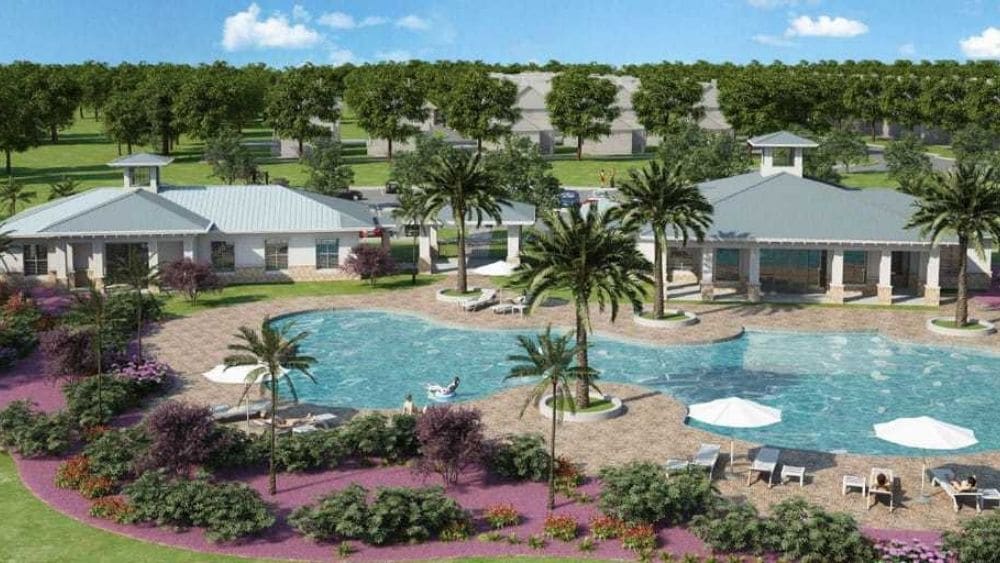 A community pool with pavilions and seating around it.