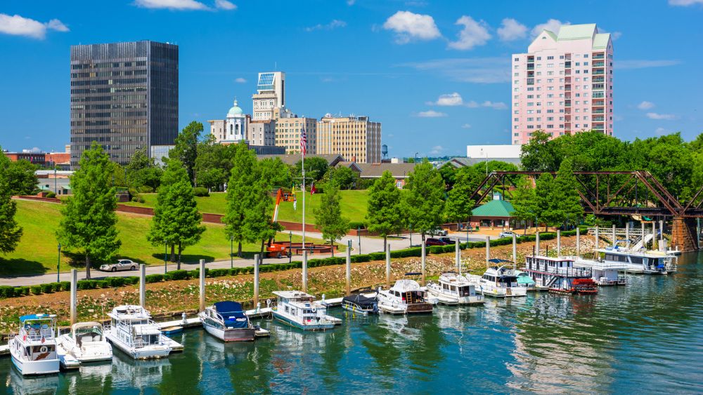 Augusta, Georgia skyline with houseboats parked in a marina in foreground