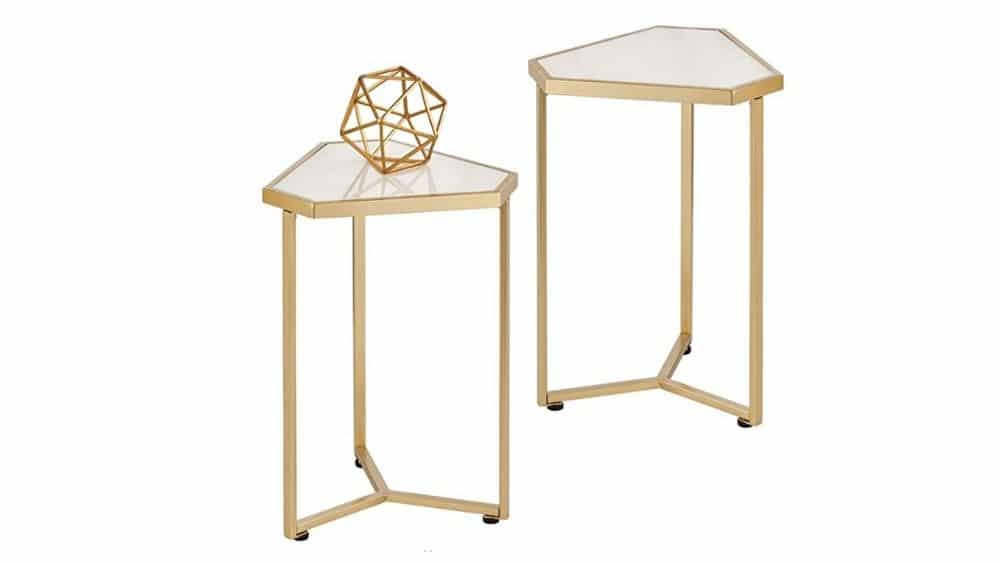Two triangular accent tables with brass, open legs