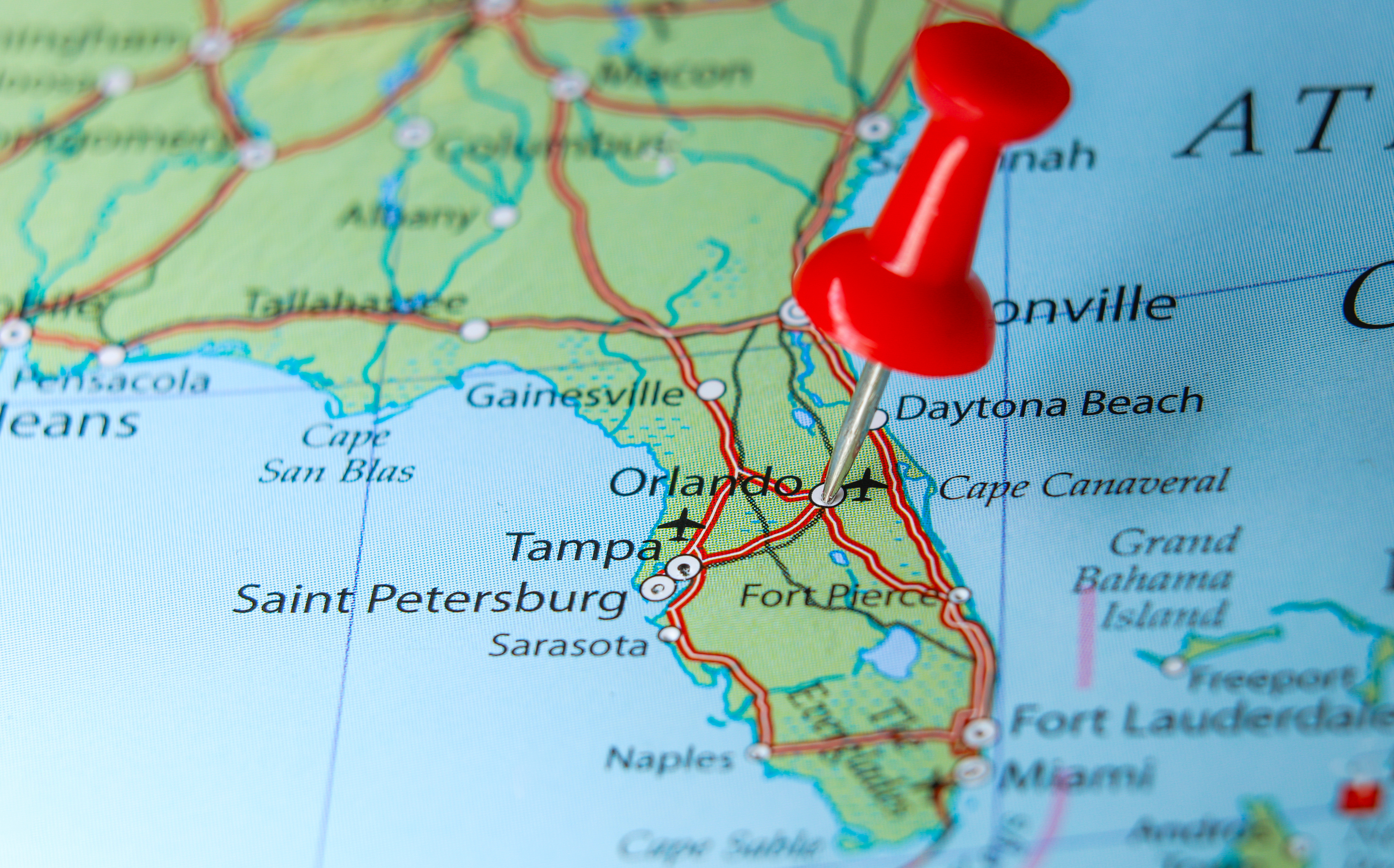 Florida map with a red thumbtack on Orlando