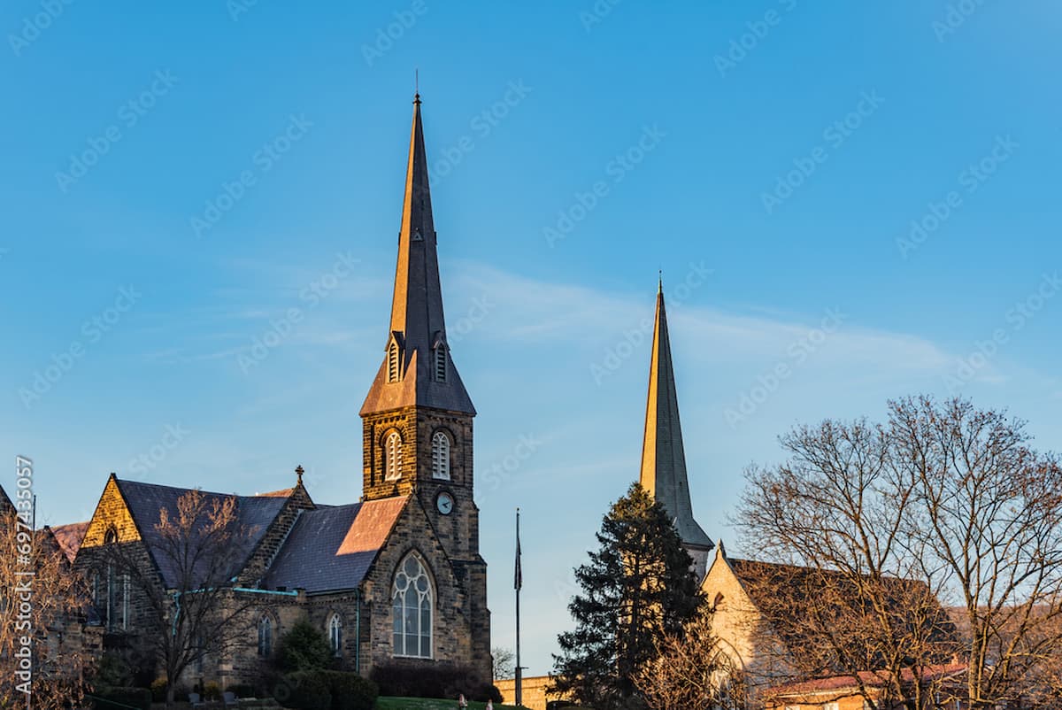 Steeples of two churches on a sunny day in Maryland