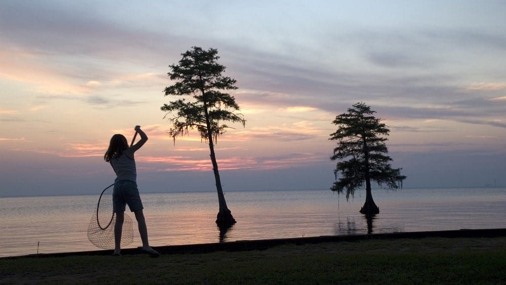 Girl with fishnet at Short Stay Navy Outdoor Recreation Area in Moncks Corner, SC.