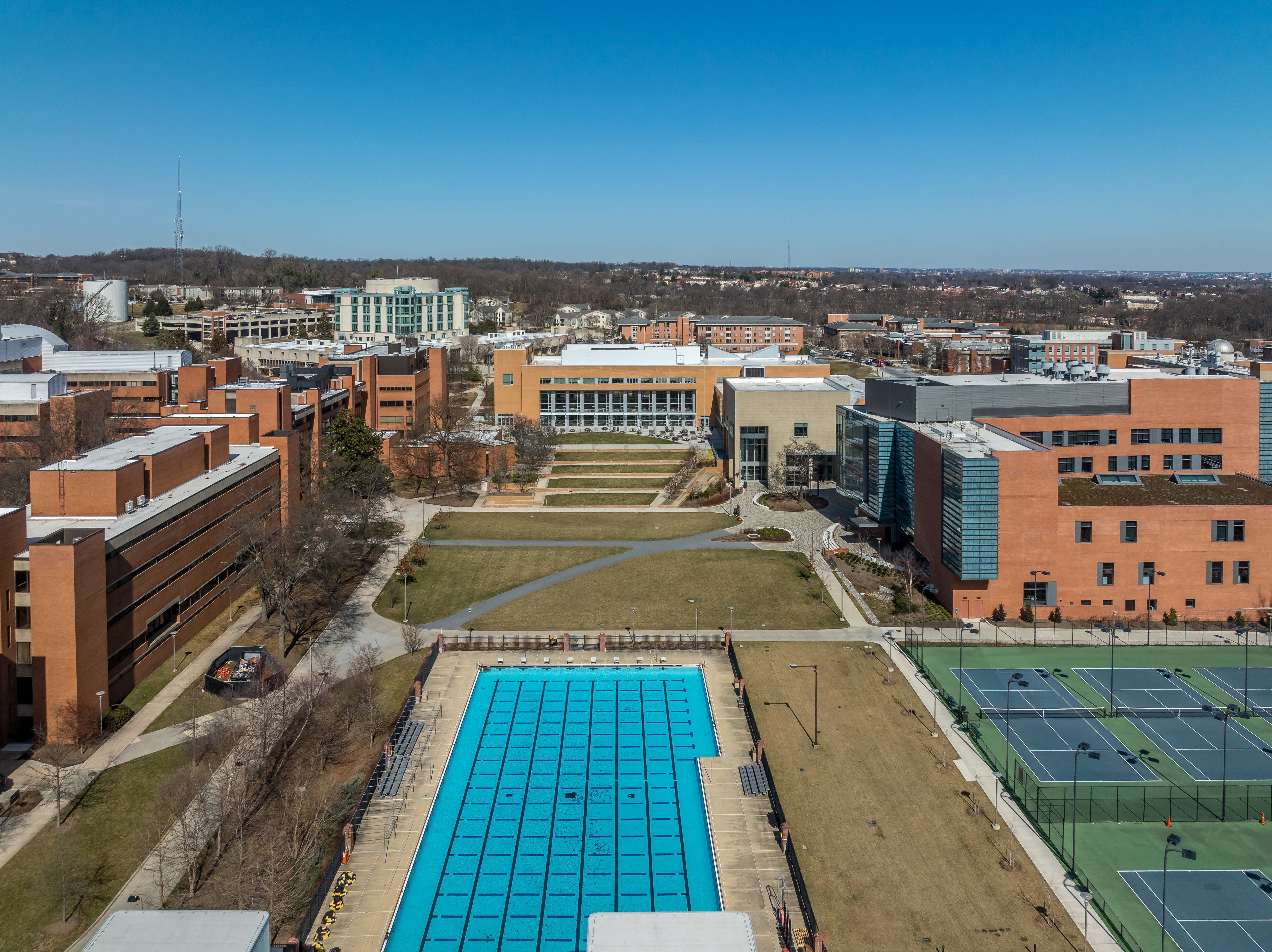 Aerial view of University of Maryland Baltimore County UMBC campus with pool, commons, quad, and more