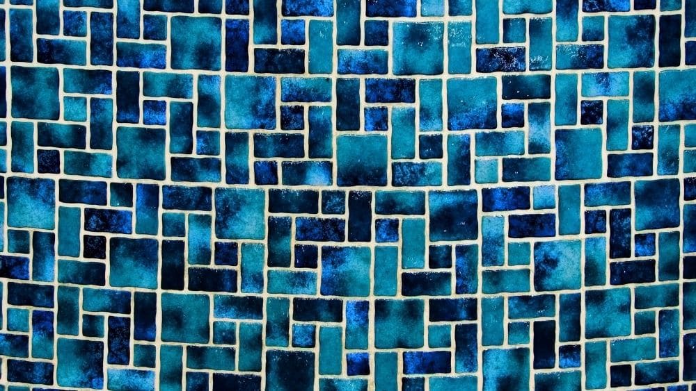 Tile wall made of various shades of blue.