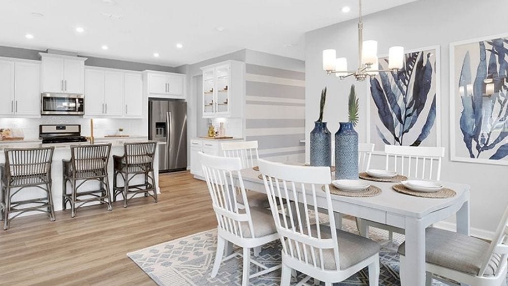 Modern open-concept dining room and kitchen.
