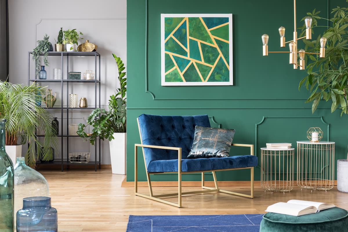 Living room, with green accent wall, and gray wall nook