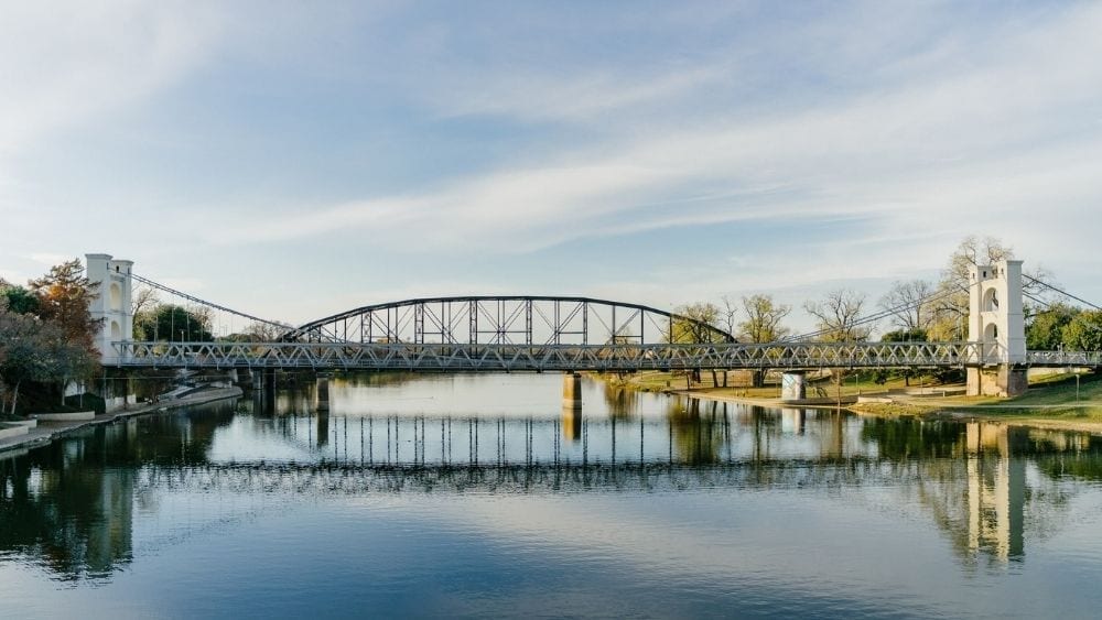 A bridge spanning a wide river.