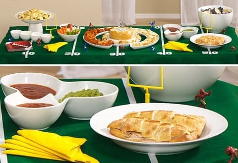Table decorated as football field and football party food.