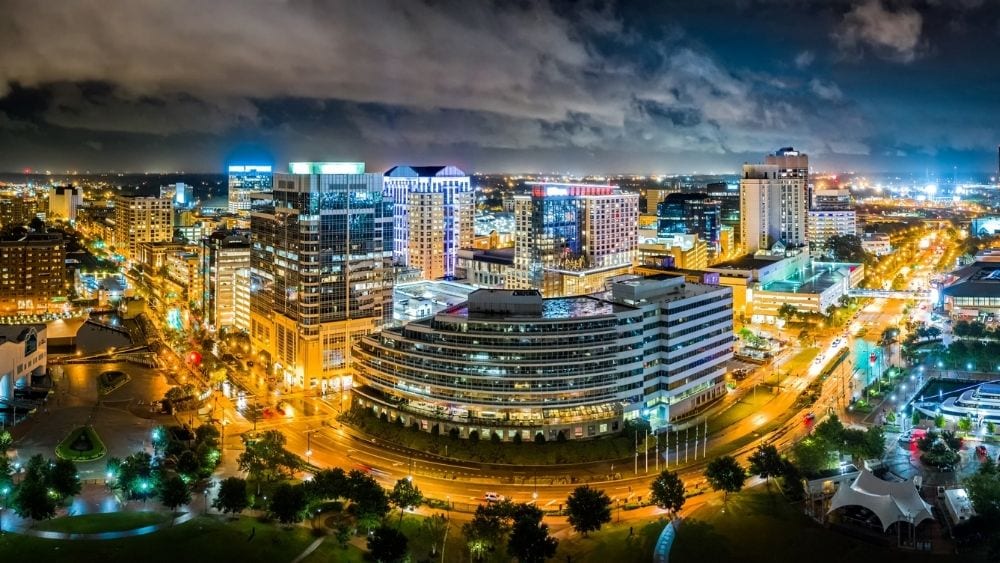 Downtown Norfolk, Virginia lit up at night.