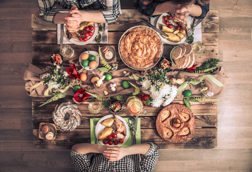 wooden table with a Thanksgiving feast