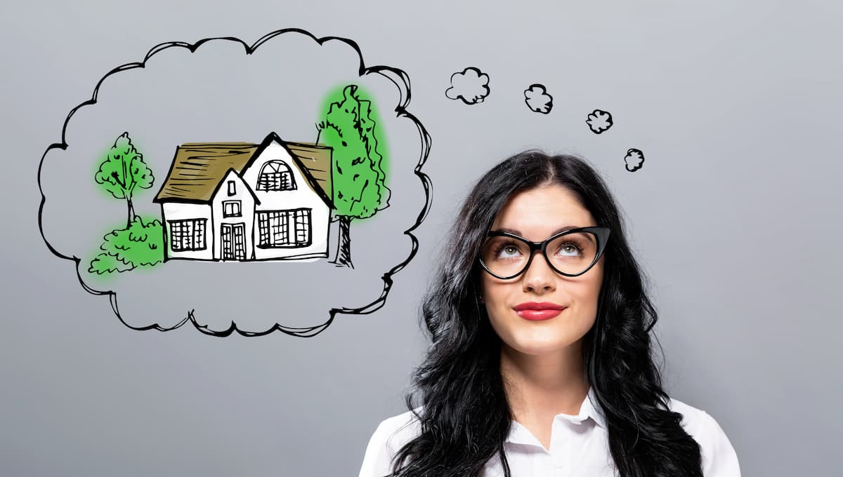 woman-dreaming-buying-new-home