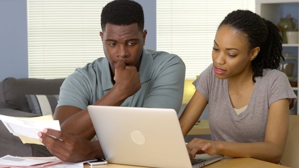Couple using a computer together