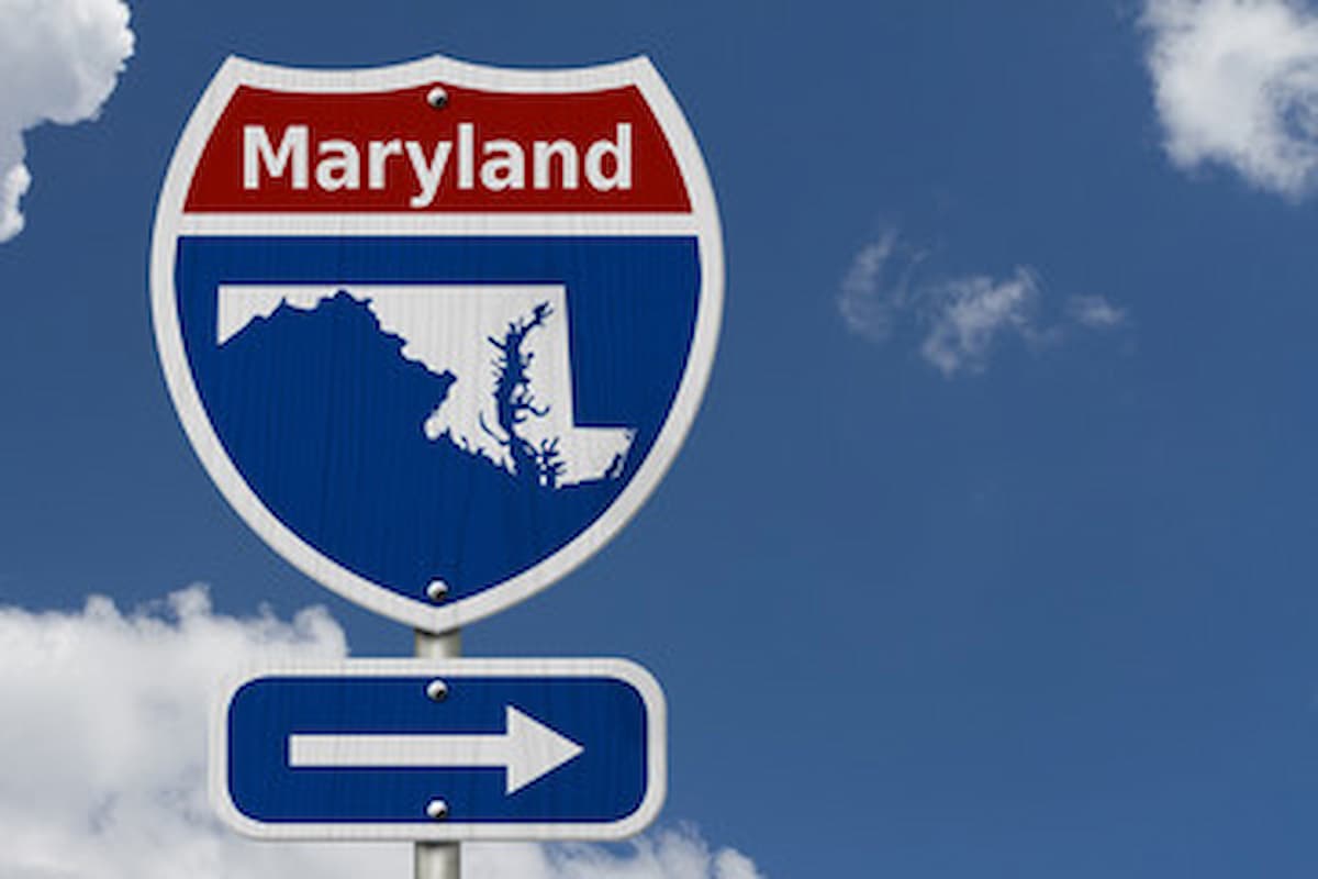 Maryland road sign with a picture of state and directional arrow