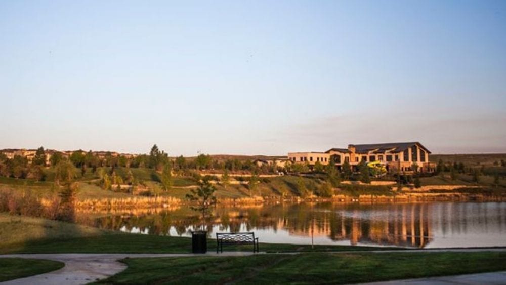 A lake with a walking path around it.